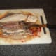Third flounder fillet has been removed