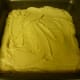 Smooth the batter out and prepare the streusel for the topping.