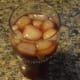 Add tea to the glass. If it isn't full, add a little bit of cold water, until glass is as full as you want it