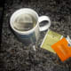 Use any kind of tea. I used one bag of green tea, and one bag of white peach oolong