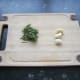 Fresh rosemary leaves and garlic cloves