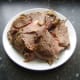Meat carved from leg of lamb