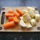 Carrot and parsnip are roughly chopped