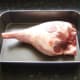 Leg of lamb ready to be rubbed with butter and roasted