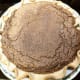 Pie is done when it rises up and forms cracks on top.