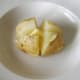 Baked potato and butter ready for filling