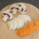Sliced carrot, mushrooms and onion