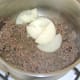 Onion is added to browned mince