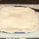Puff pastry is trimmed close for cooking