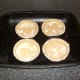 Scotch pies are glazed and ready for the oven