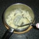 Potatoes are mashed with butter