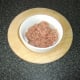 Rosemary, salt and pepper are mixed in to minced lamb