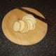 Potato is thinly sliced for deep frying