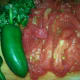 Sliced tomatoes and chopped cilantro.