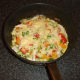 Melted cheese over chicken and peppers pizza omelette