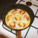 Cheese is melted over the top of the tortilla