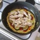 Chicken tops vegetables on pizza omelette