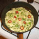 Chlli peppers are contained in fully set egg