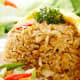 Brown rice is less liable to get soggy in . a salad, and it also brings its own nutty flavor to the dish.