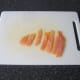 Smoked salmon is cut in to strips