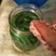 Wiping the rim with a clean cloth to remove any debris.