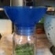 Filling the jars with fresh green beans.