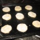 Place tea cakes on prepared pan.