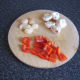 Water chestnuts, button mushrooms and red bell pepper chopped for stir frying