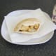 Chicken and pineapple fritter stuffed pitta bread is ready for sweet chilli sauce