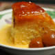 Steamed Cumquat Marmalade Pudding served with Warm Custard Sauce and Brandied Cumquats. Image: © Siu Ling Hui