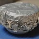 Pudding ready for steaming. Greased greaseproof paper & foil covering bowl and tightly tied with kitchen string. Image: © Siu Ling Hui