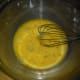 Meanwhile, in a medium-sized bowl, lightly whisk 2 eggs.