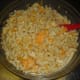 Once the macaroni has finished cooking, drain thoroughly and mix into the cheese mixture.