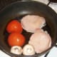 Pan frying bacon medallions, tomato and mushrooms