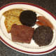 Meat and tattie scones are plated for all day Scottish breakfast