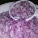 Dice the onions as finely as you can. The smaller the onions are, the easier it'll be to get them to mix into the meat... and the better the meatballs will stick to themselves.