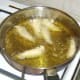 Deep frying battered sprats