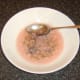 Impurities skimmed from simmering rowan jelly concentrate