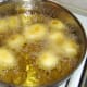 Roasting potatoes.