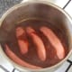 Beef sausages are added to bhuna style sauce