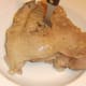 Turkey thigh is removed from part cooled stock