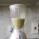 Blending celery and cannellini beans in turkey stock