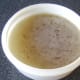 Cooled turkey stock ready to be skimmed