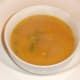 Celery, turkey and sweet potato soup is plated