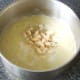 Cannellini beans and turkey are added to soup