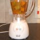 Preparing to blend celery and sweet potato