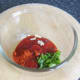 Mixing spicy tomato dip for placie fillets