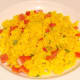 Bed of spicy rice is arranged on plate