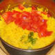 Diced peppers are added to the rice