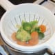 Draining boiled vegetables